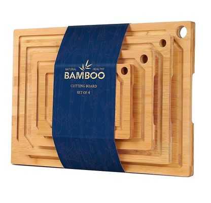 Com 4 peças em estoque, tabuleiros de corte de bambu, pré-engrasados com sulco de suco, 16 x 1,8 x 12 polegadas.