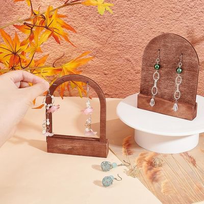 Encomenda personalizada Aceita-se Estand de exibição de brincos em forma de arco de madeira com base de coco
