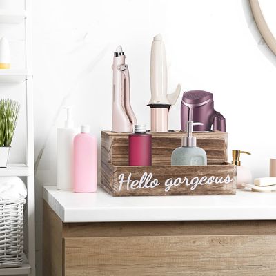 Mantenha sua casa de banho arrumada sem esforço com este aparelho de secar e endireitar cabelo de madeira