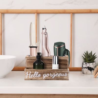 Mantenha sua casa de banho arrumada sem esforço com este aparelho de secar e endireitar cabelo de madeira