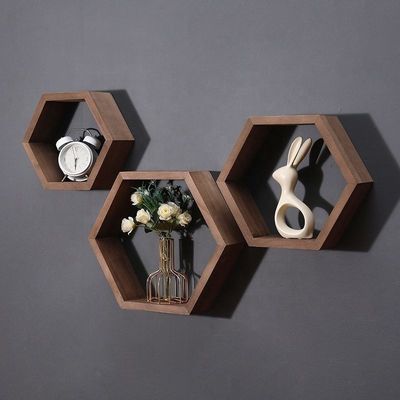 Estantes de parede de madeira de forma hexagonal geométrica para organizador de escritório de estilo moderno simples