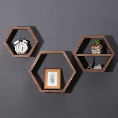 Estantes de parede de madeira de forma hexagonal geométrica para organizador de escritório de estilo moderno simples
