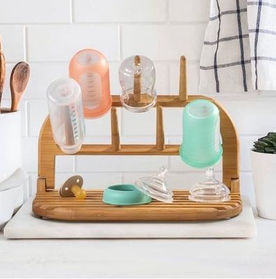 Melhore a sua experiência de secagem com o nosso rack de secagem de garrafas de bambu para bebês