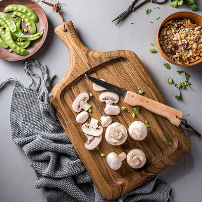 Tabela de corte de madeira de mini-acacia com design de madeira de círculo de alimentos e suporte de faca