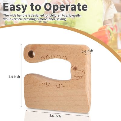 OEM Faca de madeira para crianças para cozinhar Peixes bonitos de forma de dinossauro Kitchen Toy Vegetable Cutter
