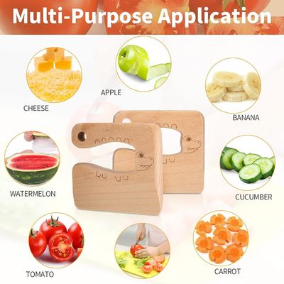 OEM Faca de madeira para crianças para cozinhar Peixes bonitos de forma de dinossauro Kitchen Toy Vegetable Cutter