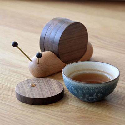 Coasters de nozes pretas Design criativo de caracol Copo de isolamento de madeira Prato estilo moderno